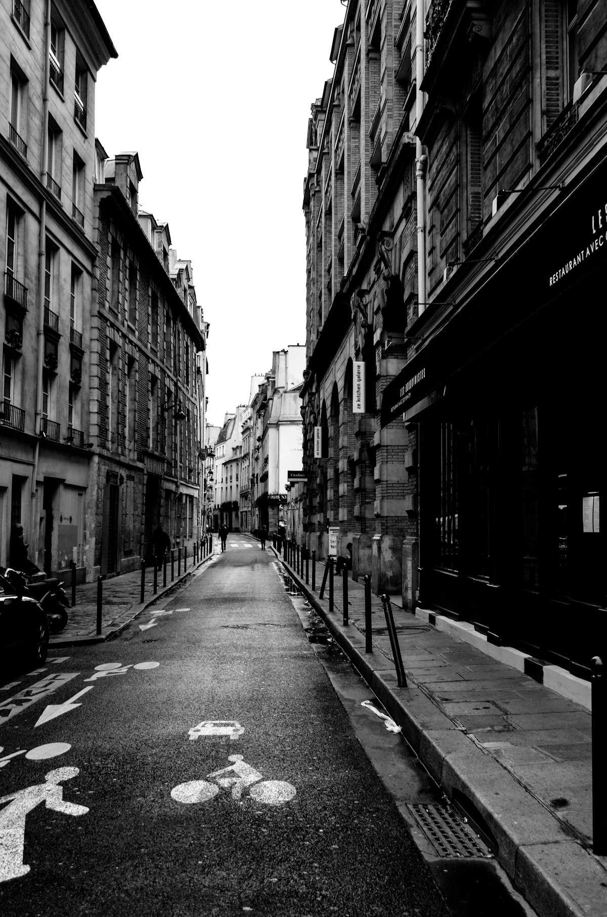A quiet Paris street photographed in black and white